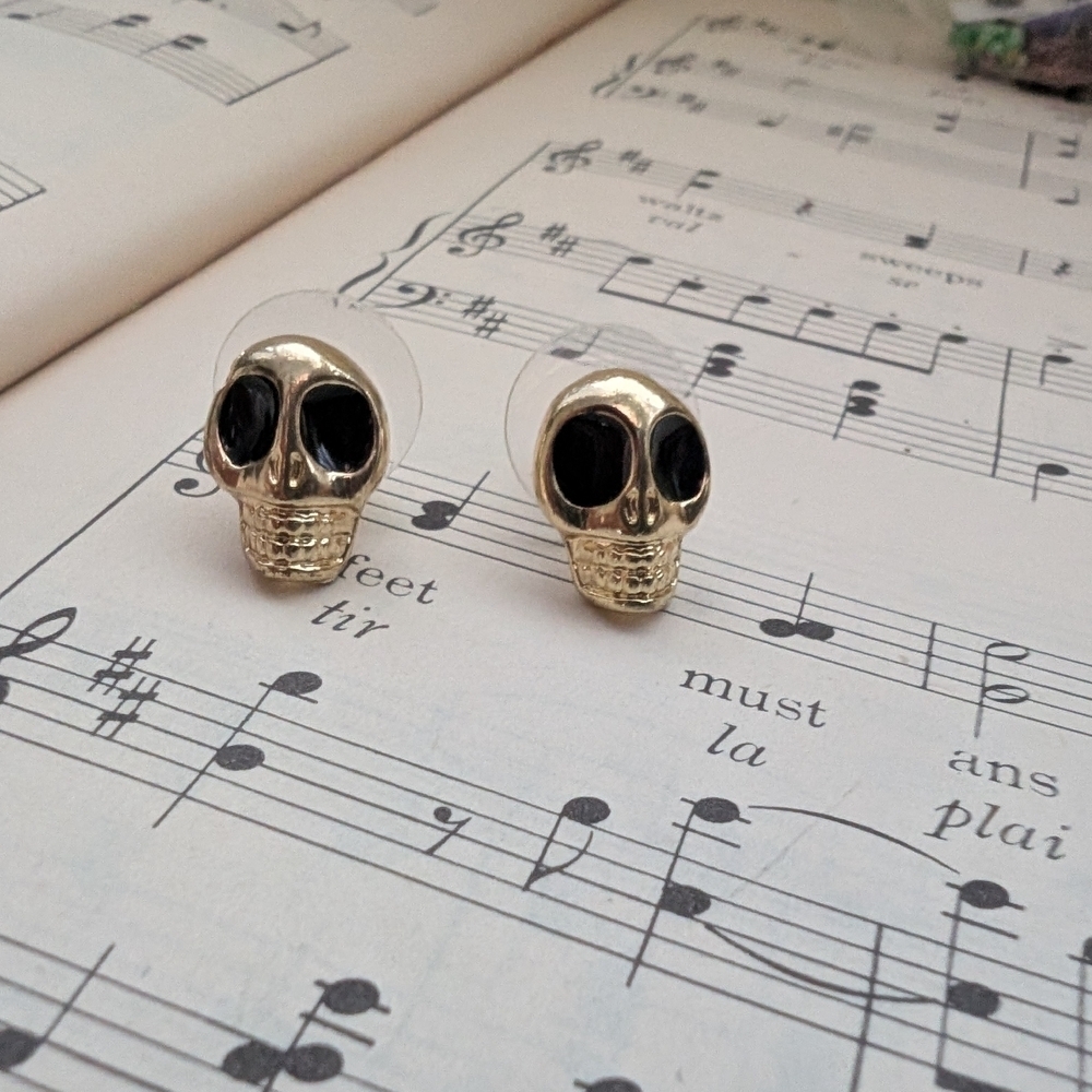 Gold Skull Earrings with Black Accents
